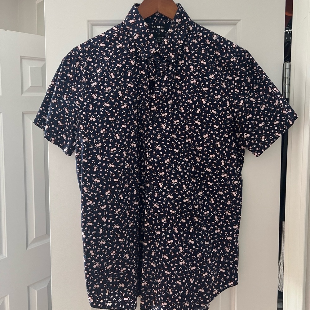 Price Drop! Express short sleeve button down! Stylish and bold flower pattern!